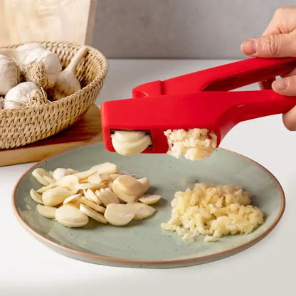 Sleek red manual press garlic crusher kitchen grinder