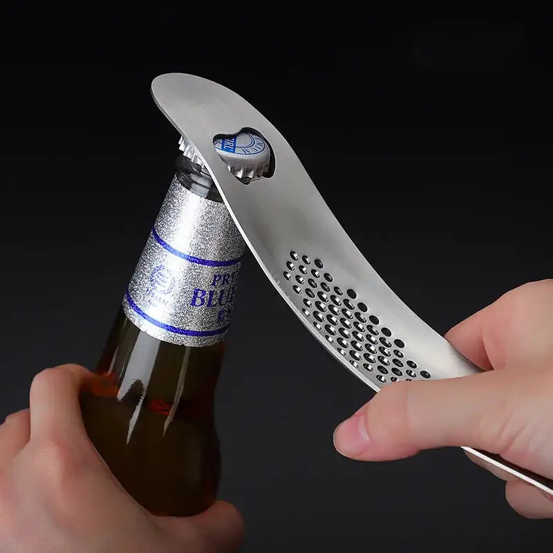 Sleek stainless steel garlic press with integrated spoon kitchen tool