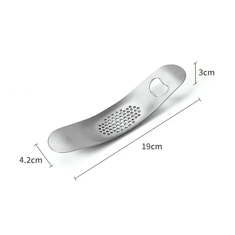 Sleek stainless steel garlic press with integrated spoon kitchen tool
