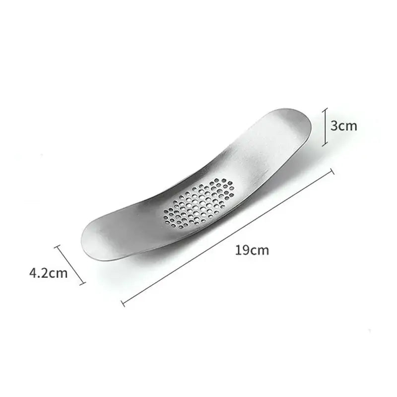 Sleek stainless steel garlic press with integrated spoon kitchen tool