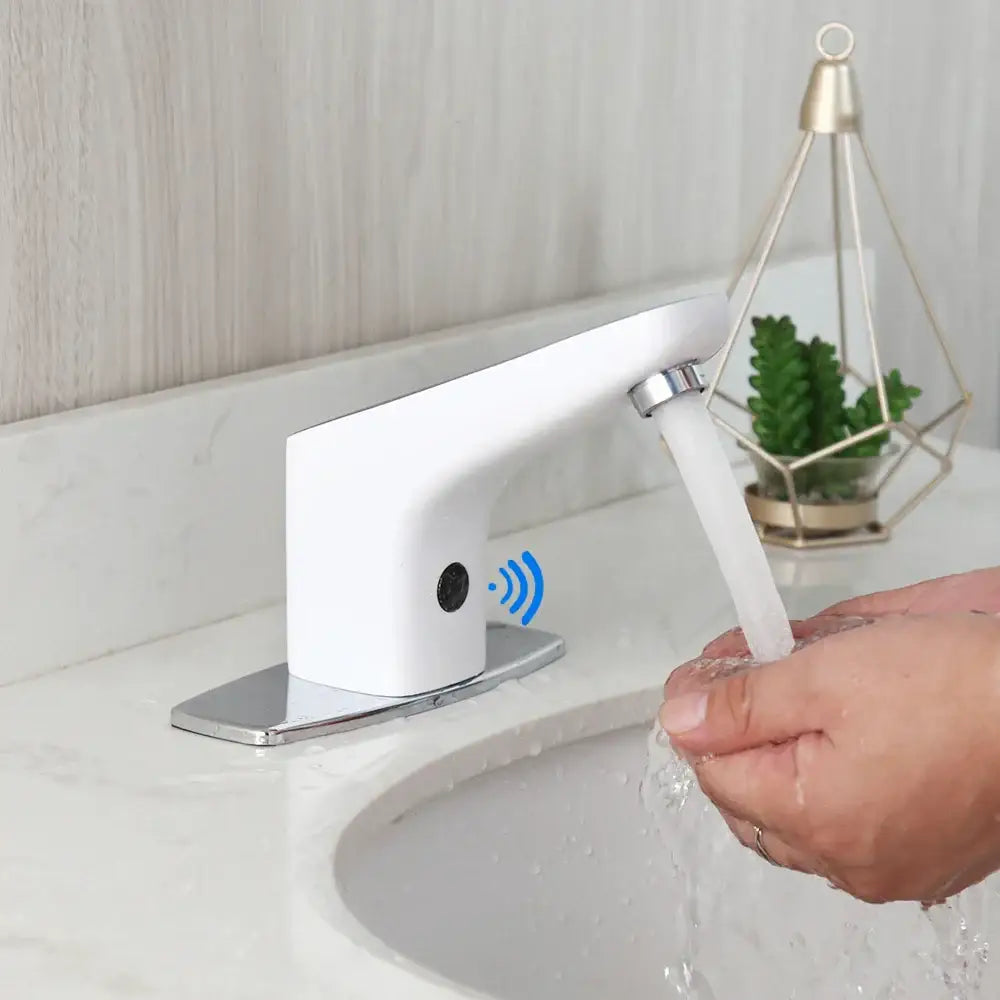 Sleek white automatic sensor bathroom faucet with curved design