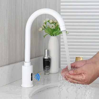 Sleek white automatic sensor bathroom faucet with curved design