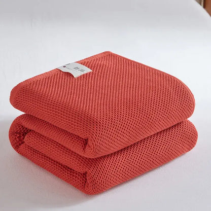 Soft beige cotton honeycomb towel blanket for living room couch