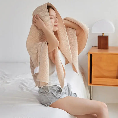 Soft beige cotton honeycomb towel blanket for living room couch