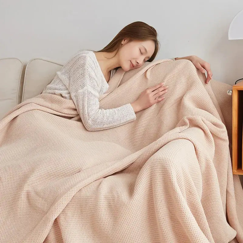 Soft beige cotton honeycomb towel blanket for living room couch