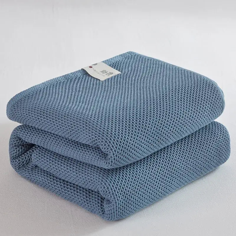 Soft beige cotton honeycomb towel blanket for living room couch