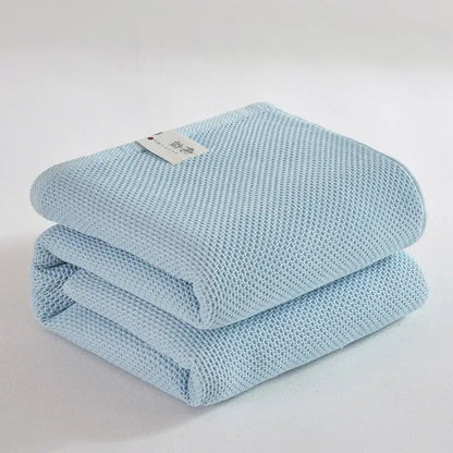 Soft beige cotton honeycomb towel blanket for living room couch