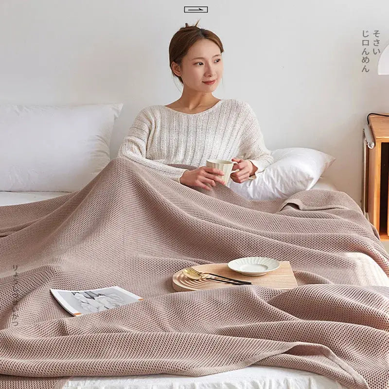 Soft beige cotton honeycomb towel blanket for living room couch