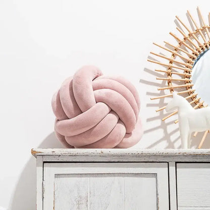 Soft pink velvet knotted ball round pillow for bedroom decor