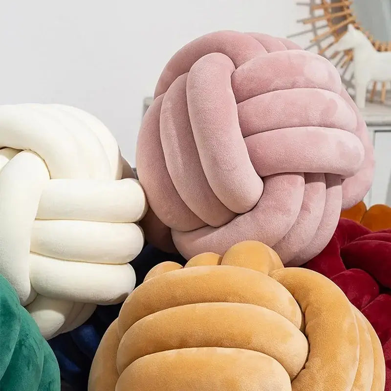 Soft pink velvet knotted ball round pillow for bedroom decor