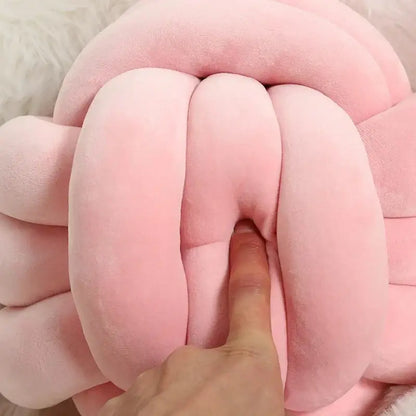 Soft pink velvet knotted ball round pillow for bedroom decor