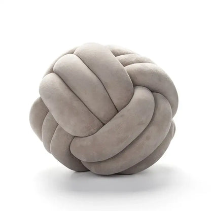 Soft pink velvet knotted ball round pillow for bedroom decor