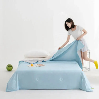 Soft teal and gold cool fibre summer quilt bedroom blanket