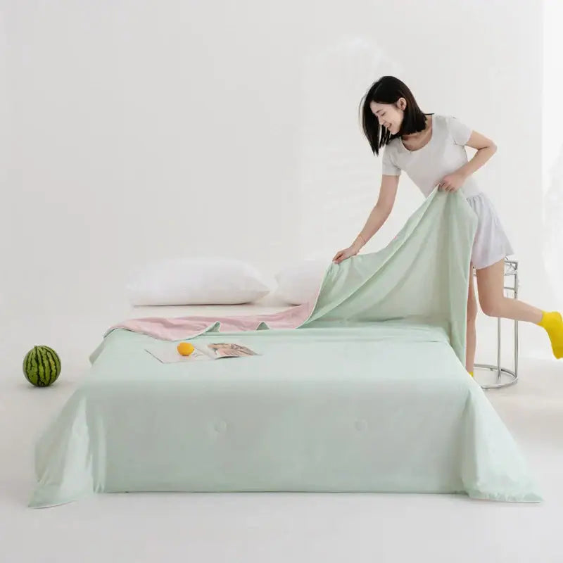 Soft teal and gold cool fibre summer quilt bedroom blanket