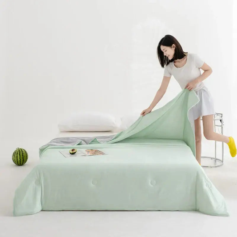 Soft teal and gold cool fibre summer quilt bedroom blanket