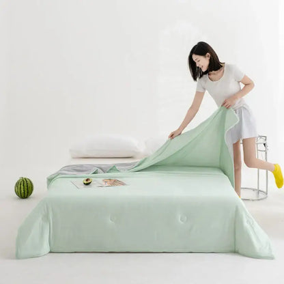 Soft teal and gold cool fibre summer quilt bedroom blanket