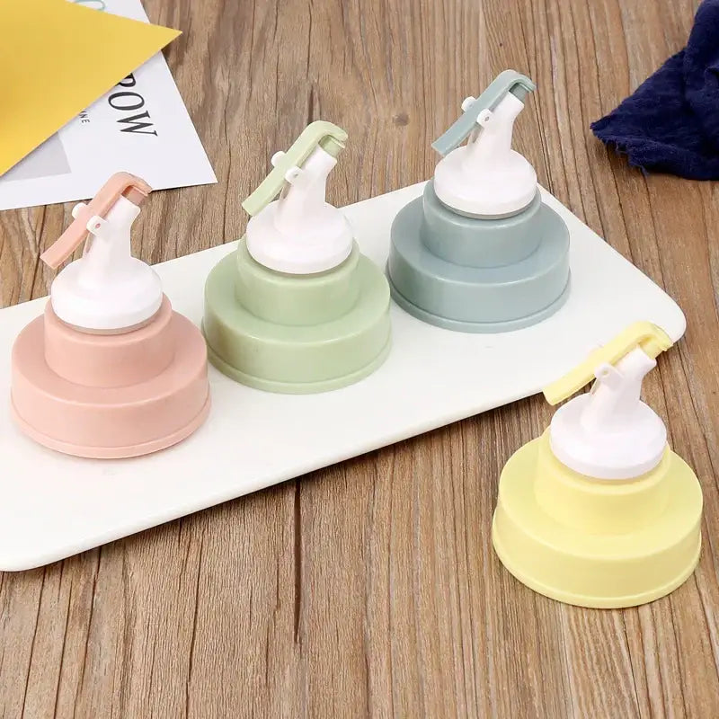 Stainless steel bottle cap stopper with colored handle kitchen nozzle