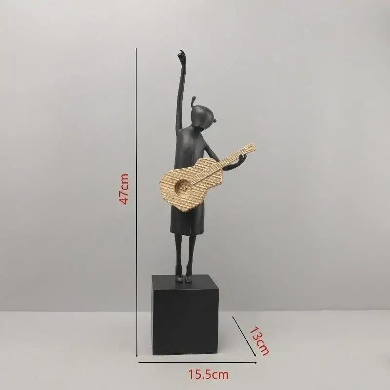 Stylized black and gold guitarist resin figure – living room decor