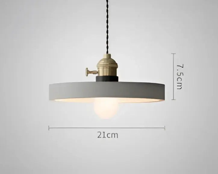 Teal blue glass pendant light with brass hardware for dining room
