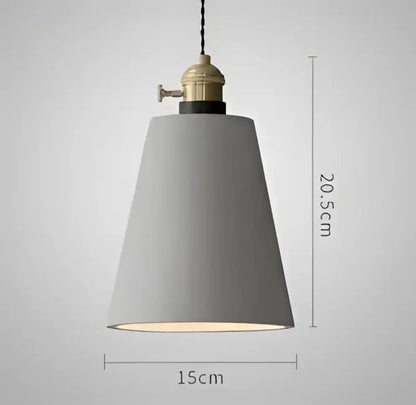 Teal blue glass pendant light with brass hardware for dining room