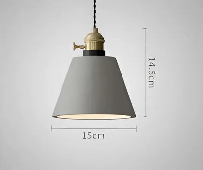 Teal blue glass pendant light with brass hardware for dining room