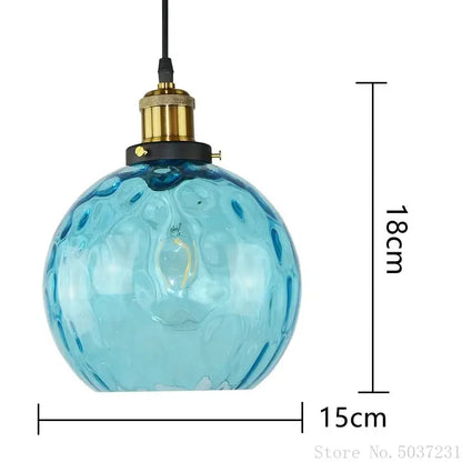Textured blue glass ball pendant light for dining room