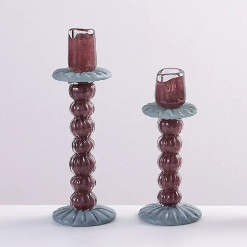 Textured burgundy and light blue glass candlestick holder dining room