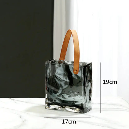 Textured clear glass vase with leather handles living room decor