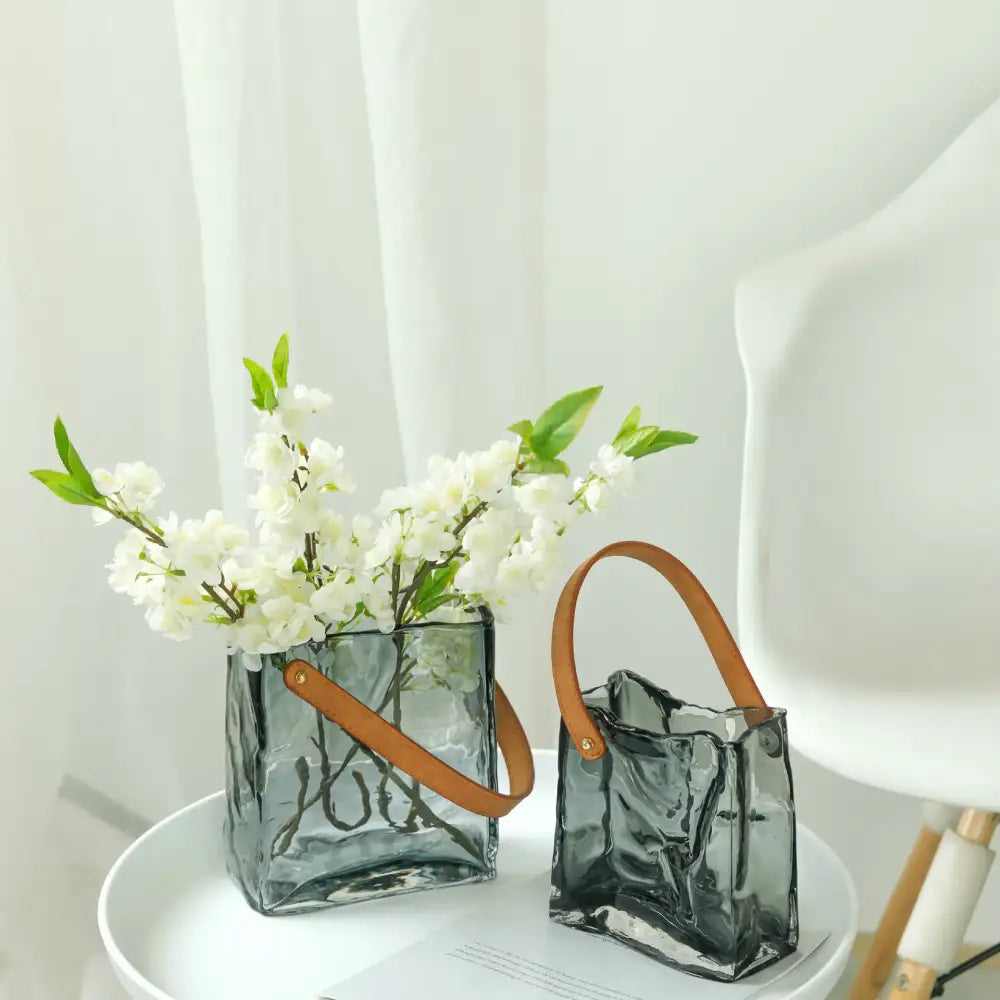 Textured clear glass vase with leather handles living room decor