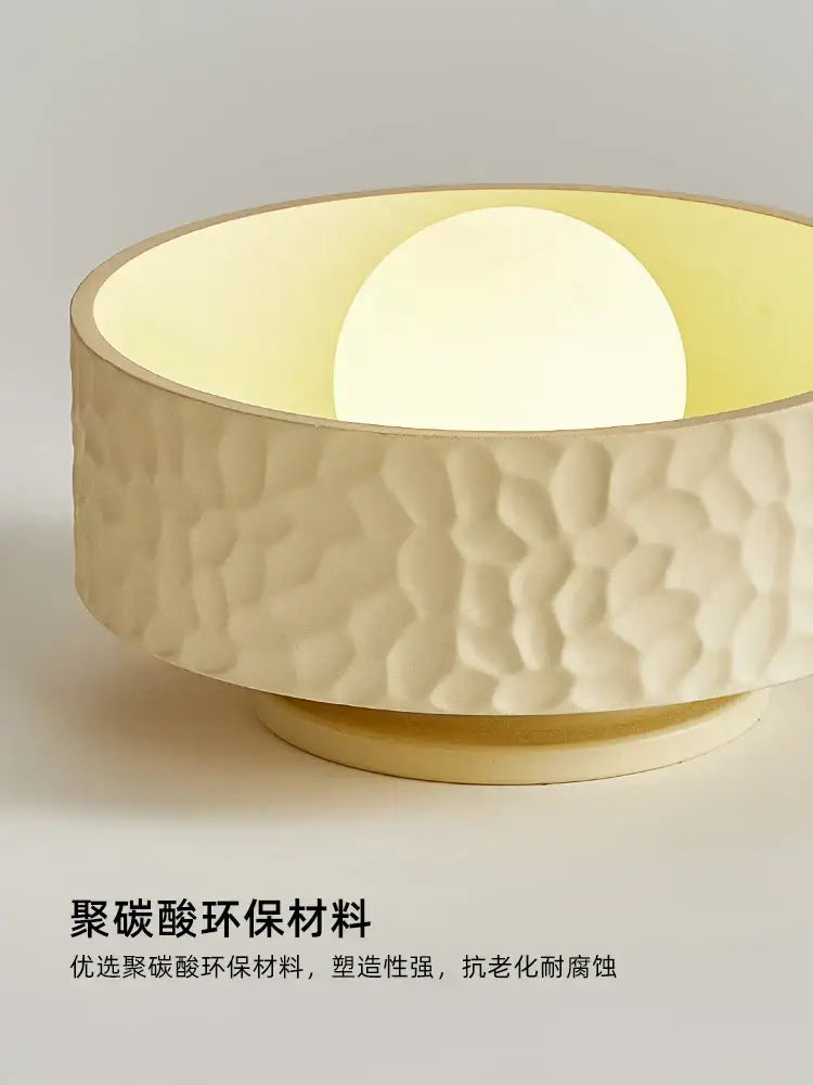 Textured cream ceiling light with gold trim for living room