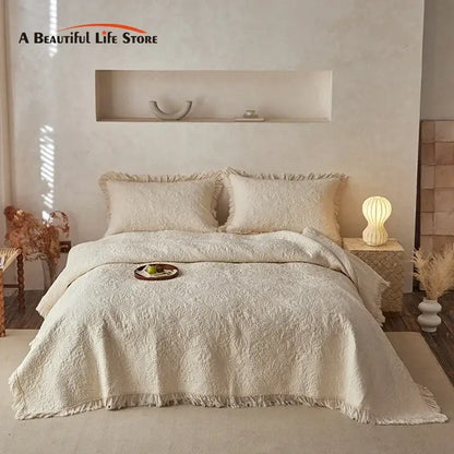 Textured cream cotton quilted bedspread set for bedroom with fringes