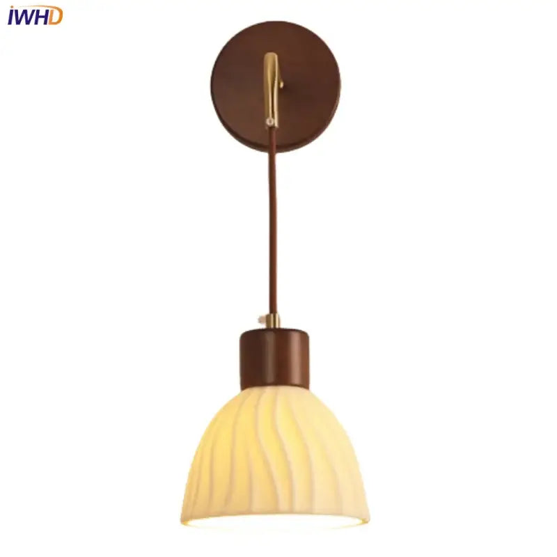 Textured glass and brass wall light fixture for dining room