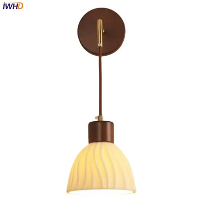 Textured glass and brass wall light fixture for dining room