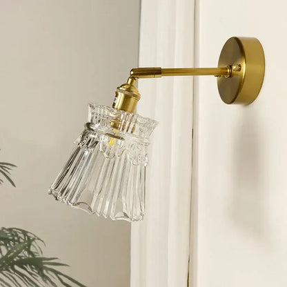 Textured glass brass mirror wall sconce for bedroom