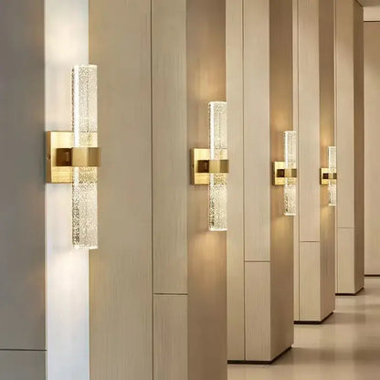 Textured glass gold wall sconce bedroom warm diffusing light
