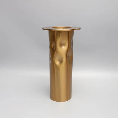 Textured golden metal candlestick holder set for dining room