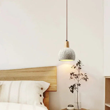 Textured gray cement and wood pendant lamp for dining room