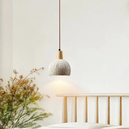 Textured gray cement and wood pendant lamp for dining room