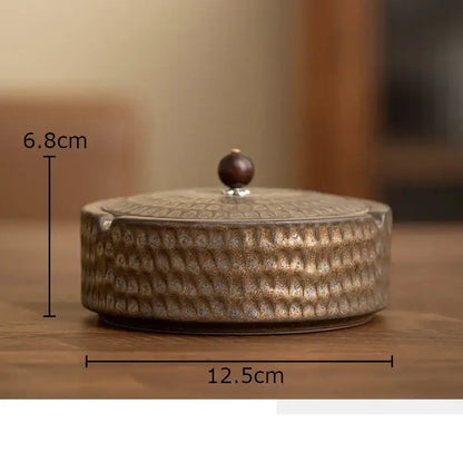 Textured green ceramic ashtray with wooden lid for office or living room