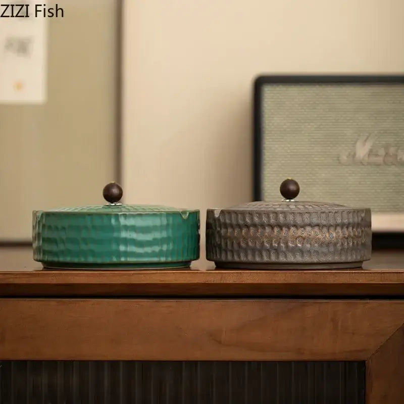 Textured green ceramic ashtray with wooden lid for office or living room