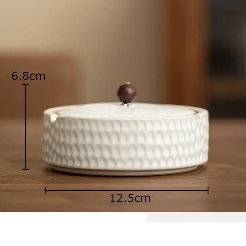 Textured green ceramic ashtray with wooden lid for office or living room