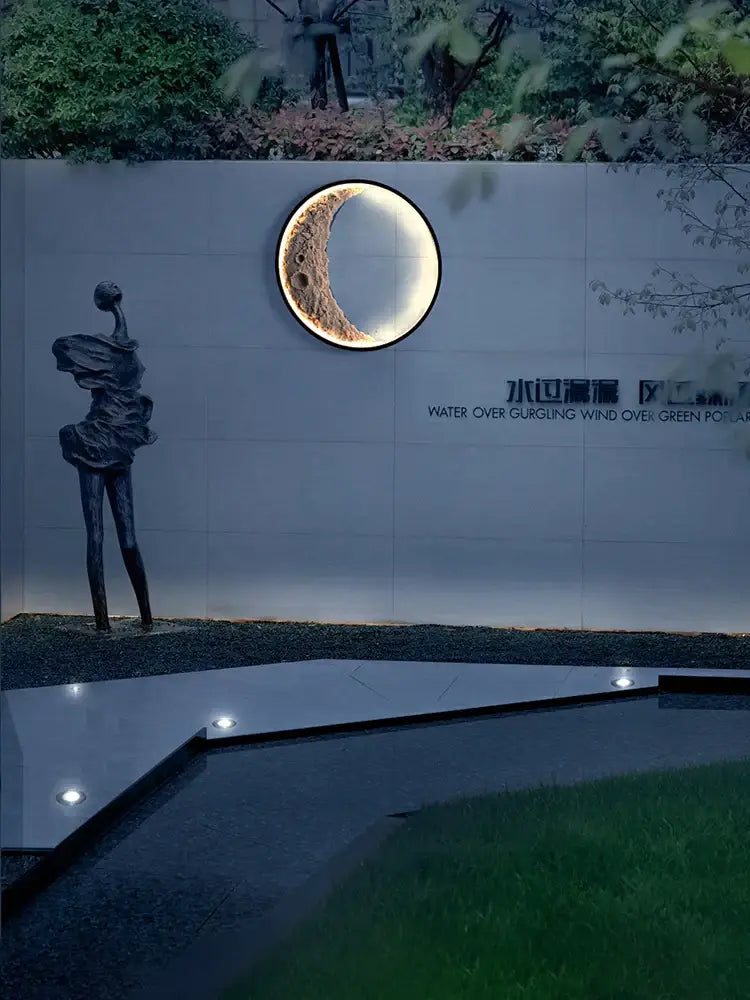 Textured moon crescent wall lamp – garden terrace warm lighting