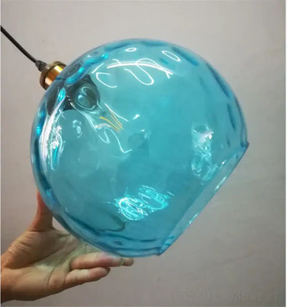 Textured turquoise blue glass ball pendant light for kitchens