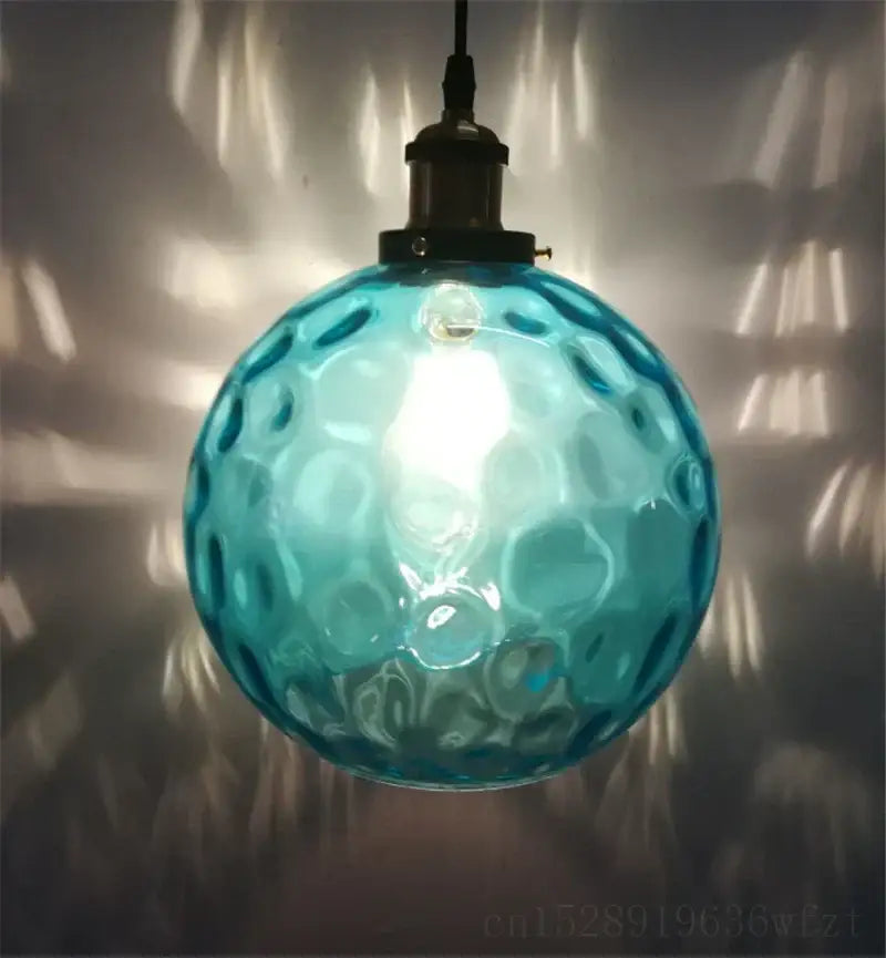 Textured turquoise blue glass ball pendant light for kitchens