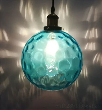 Textured turquoise blue glass ball pendant light for kitchens