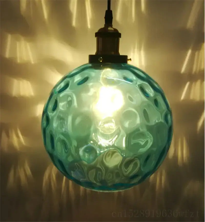 Textured turquoise blue glass ball pendant light for kitchens