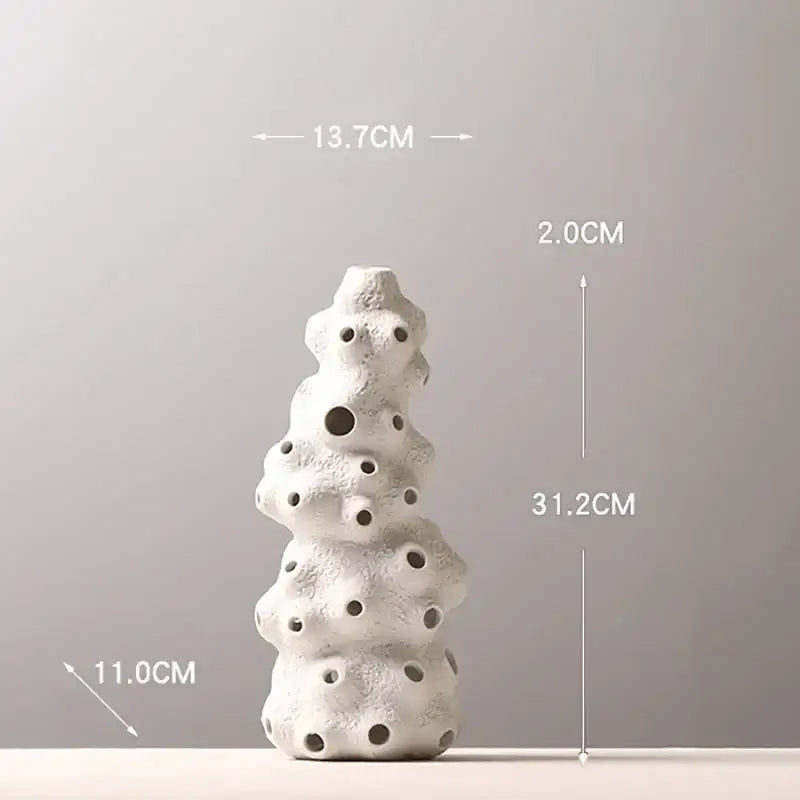 Textured white ceramic vase set with artificial flowers living room