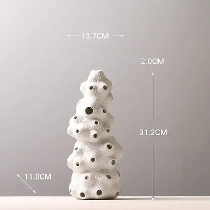 Textured white ceramic vase set with artificial flowers living room