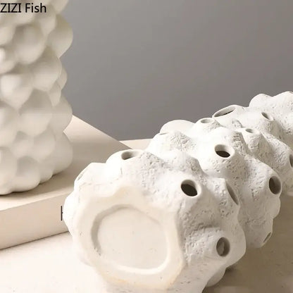 Textured white ceramic vase set with artificial flowers living room