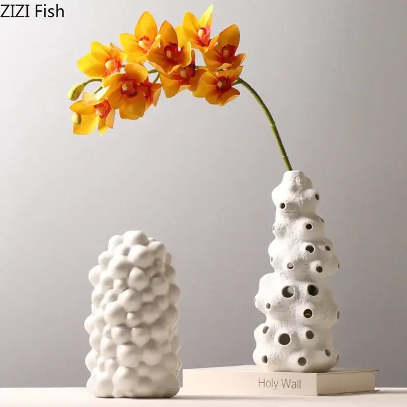Textured white ceramic vase set with artificial flowers living room
